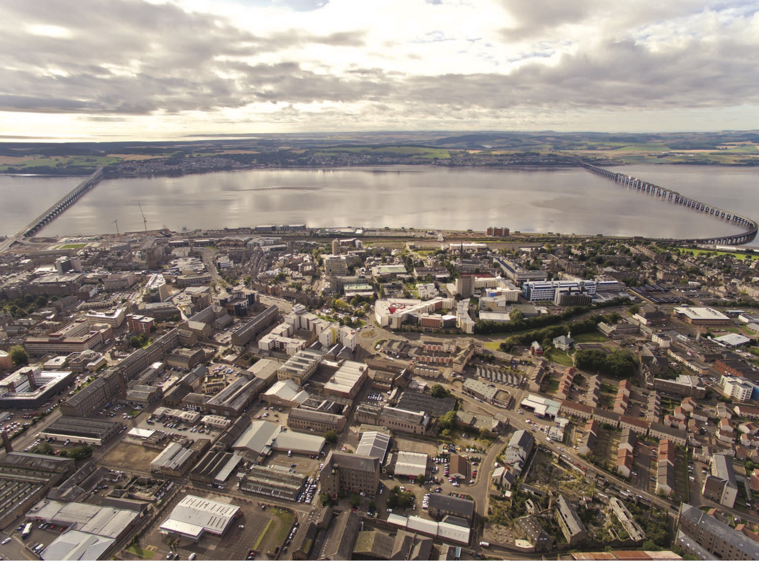 Looking north over Dundee showing the waterfront development and site for V&A Dundee.